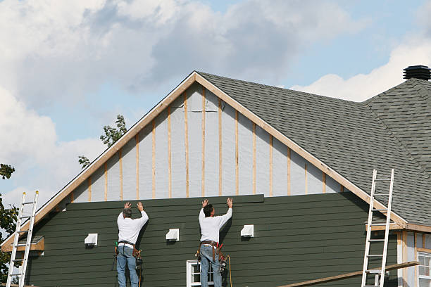 Professional Siding technician working in Horntown, VA